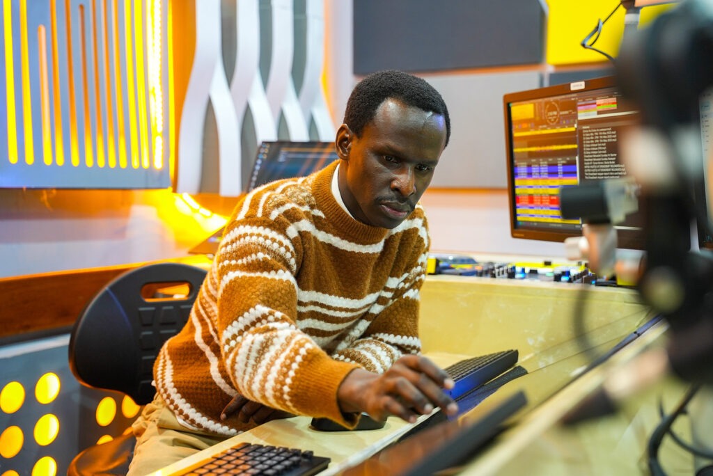 Fred Martin Kiwalabye at the controls at Radio47